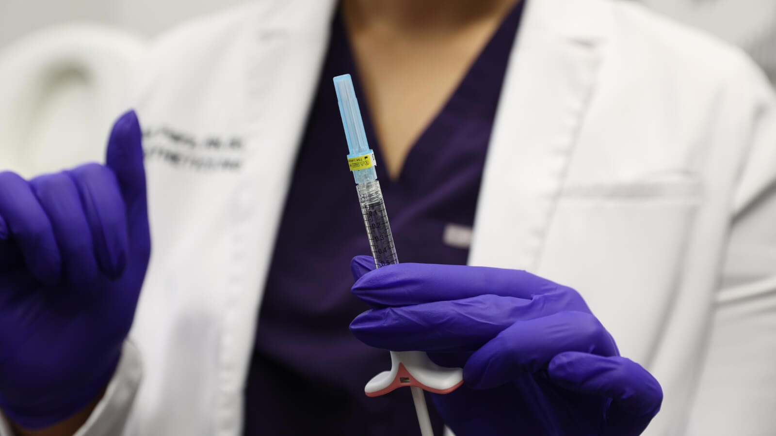 closeup of lip filler needle