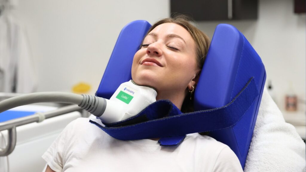 Woman getting a CoolSculpting treatment