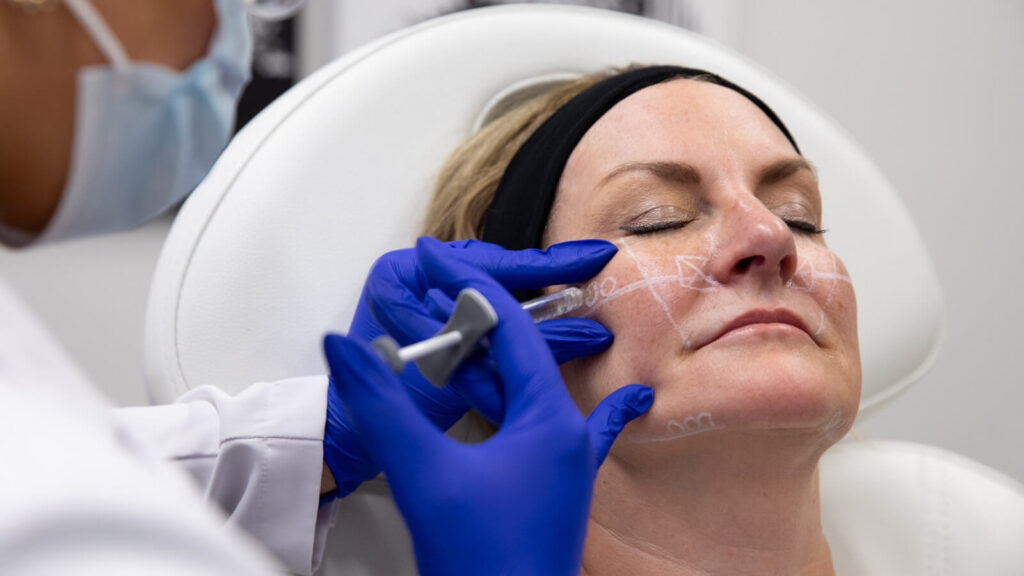 Person receiving cheek fillers