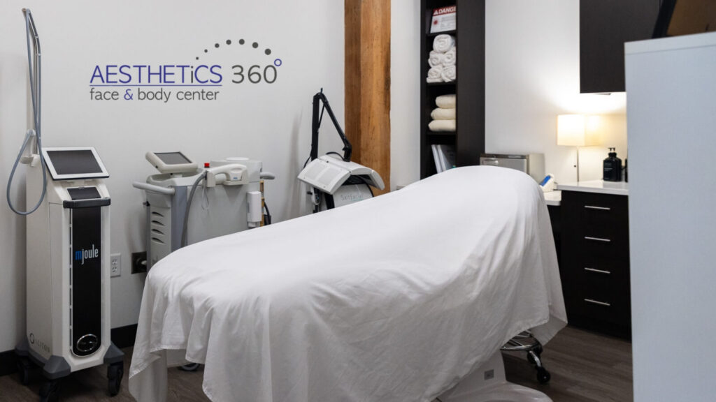 Aesthetics 360 treatment room with bed